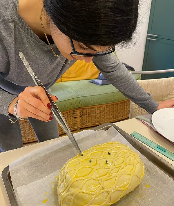 Valentina decorating a homemade pastry